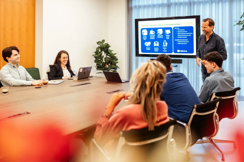 Helixiora team discussing an AI implementation strategy